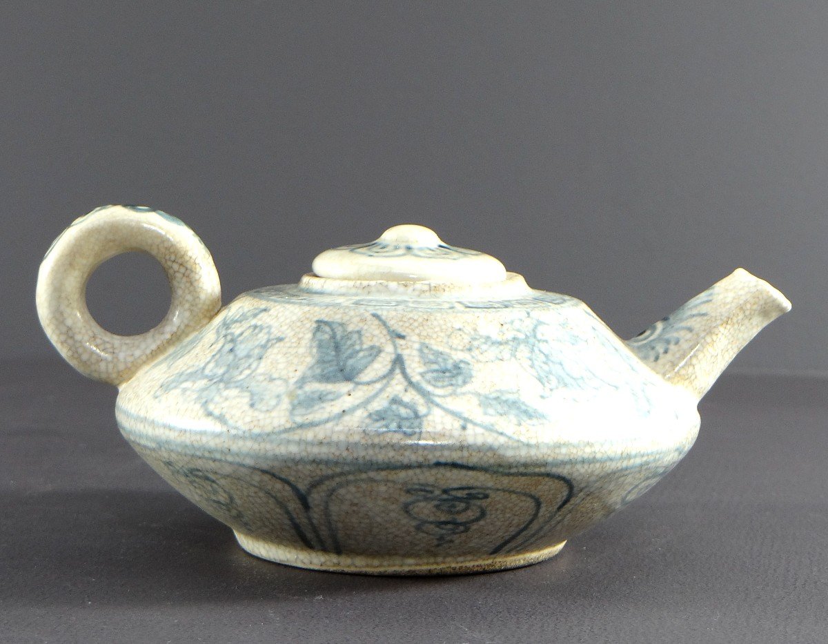Vietnam, Mid-20th Century, Cracked Porcelain Teapot With Floral Decor In Blue.