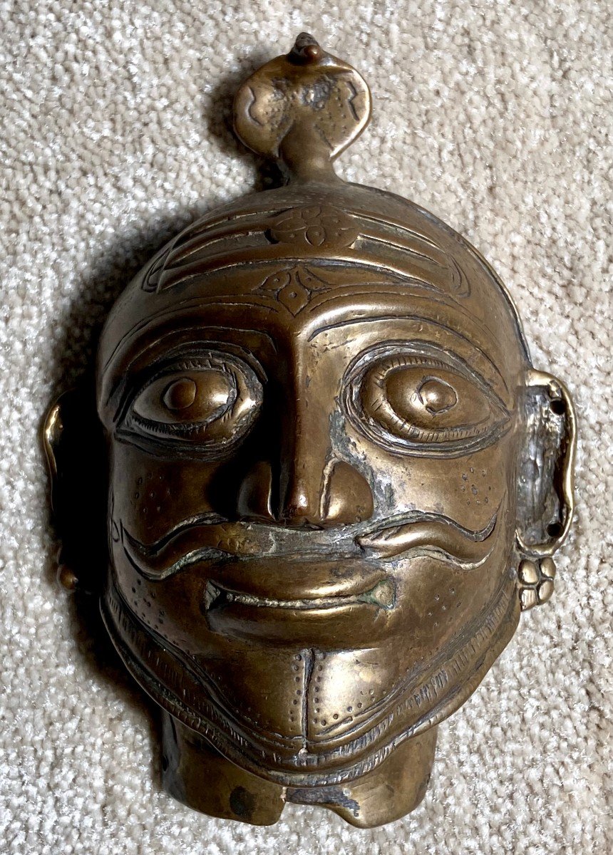 South India, XIXth Century, Mask Of Shiva Mukhalinga In Bronze.