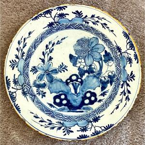 Delft, XVIIIth Century, Earthenware Dish Decorated With A Flowery Rock.