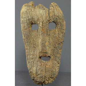 Indonesia, Island Of Timor, 19th Century, Old Anthropomorphic Mask In Very Eroded Wood. 