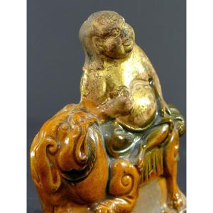 China, Late 18th-early 19th Century, Glazed Earthenware Group Depicting A Seated Putai