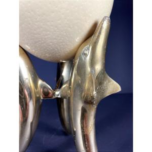 France, Ostrich Egg Mounted On A Brass Tripod Base With A Representation Of Dolphins, 1970.