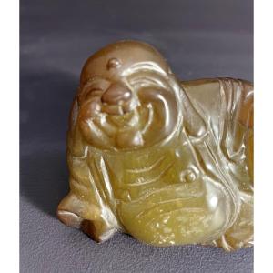 Chine, première moitié du XXème siècle, sculpture en jade néphrite représentant un Budai.