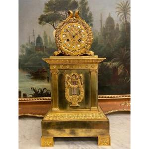 French Empire Mantel Clock In Gilt Bronze