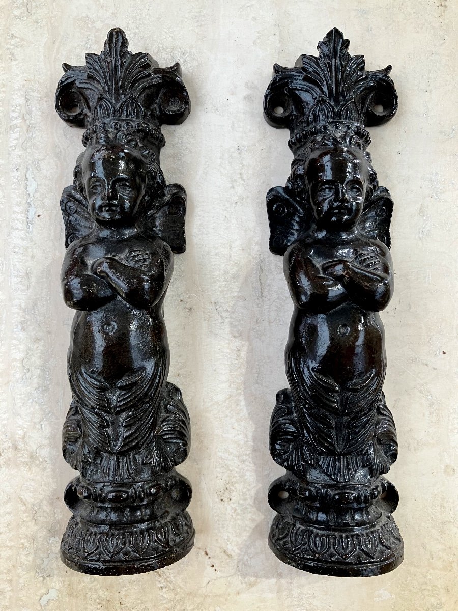 Pair Of Crowned Angels In  Cast Iron