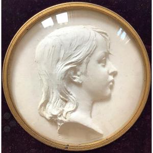 Profile Of A Children. Bas-relief Plaster By Eugène Laurent