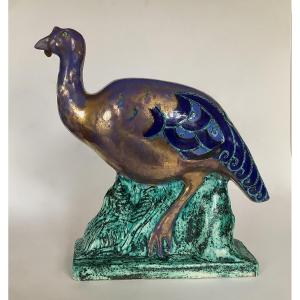 Raoul Lamourdedieu et Edouard Cazaux pour Evolution . Important sujet Art Déco en céramique