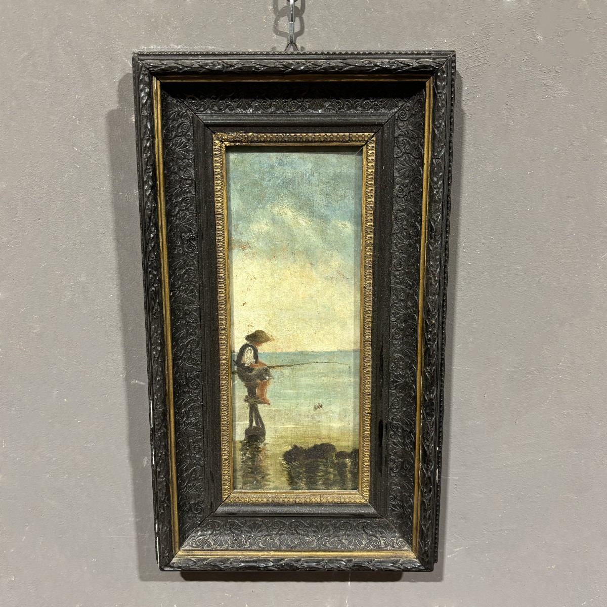 Peinture à l'huile sur panneau représentant un pêcheur et une scène marine.