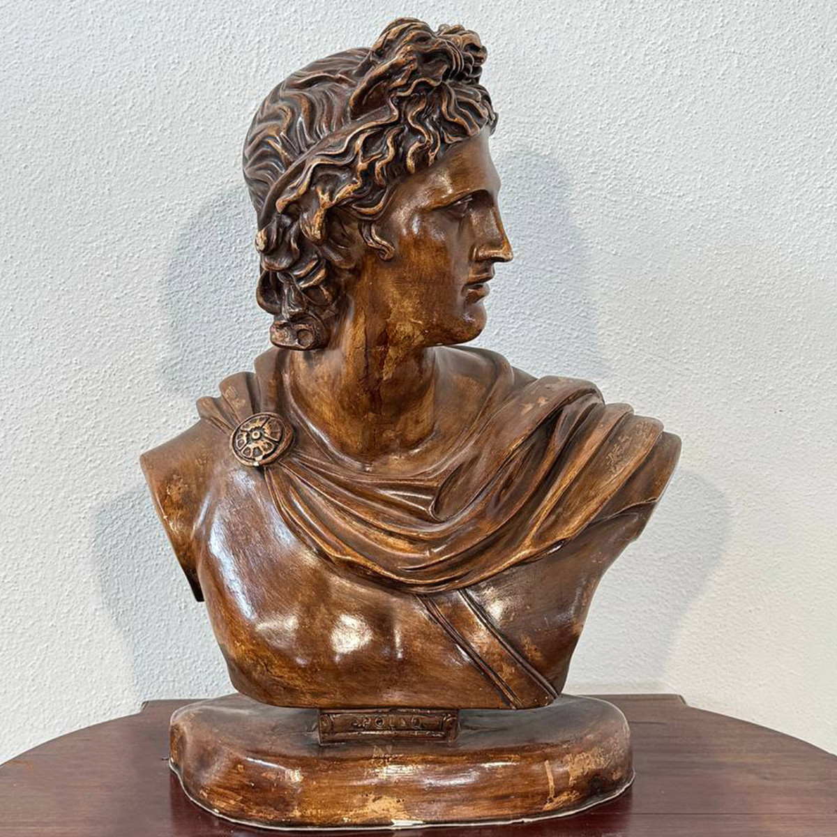 Bust Of Apollo In Patinated Terracotta – Neoclassical Style Sculpture