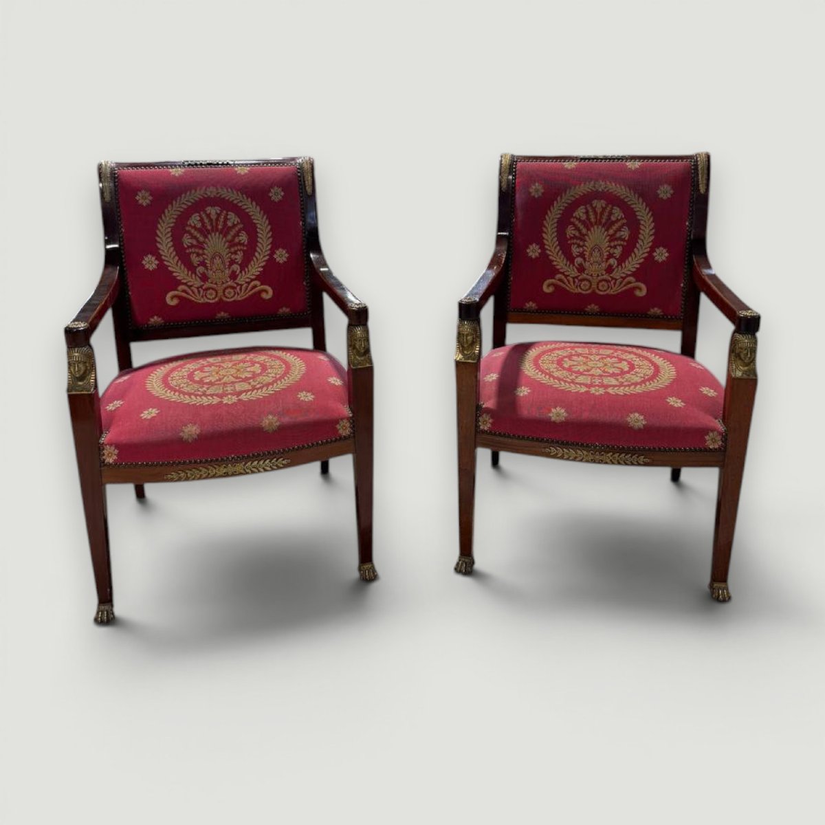 Paire de fauteuils Empire Napoléon III en bois et bronze doré