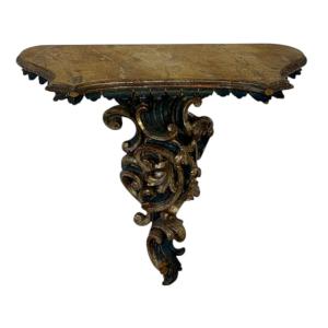 Console murale en bois sculpté et doré de style rococo