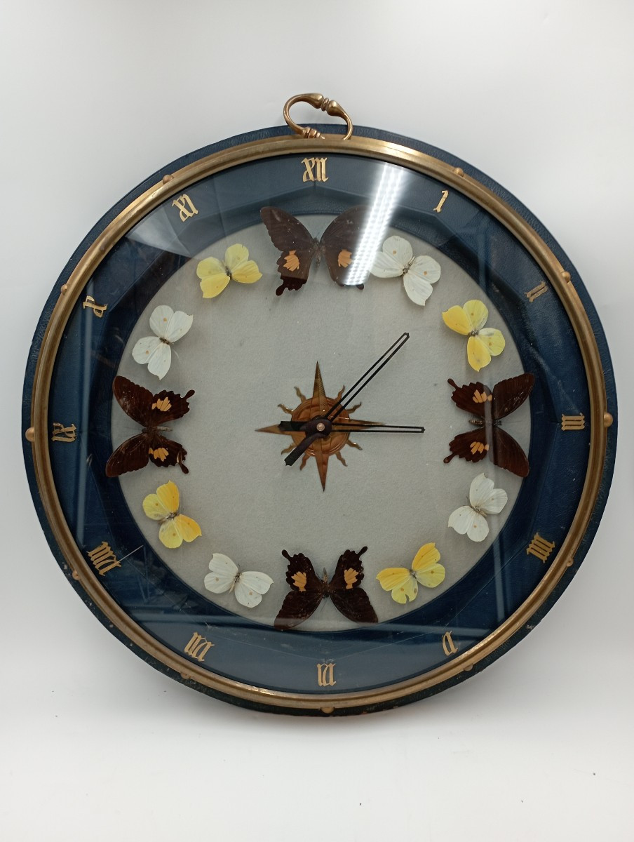 Pendule murale aux papillons attribuée a Adnet