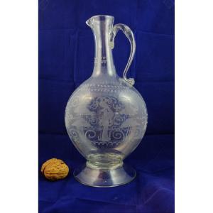 Large Ewer Or Carafe With Flat Body In Blown And Engraved Glass 18th Century.