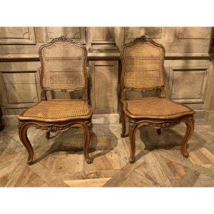 Paire De Chaises Cannées En Noyer Sculpté Et Mouluré – Attribuée à Nogaret .epoque Louis XV.