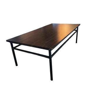 Grande table gainé cuir et plateau en formica par Jacques Adnet