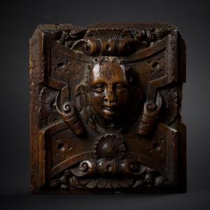Panneau en bois sculpté à tête d'angelot, Renaissance (Fontainebleau), fin XVIe début XVIIe