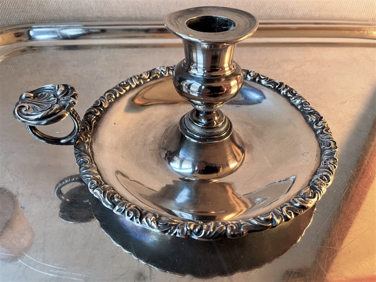 Bougeoir à main en argent (minerve)