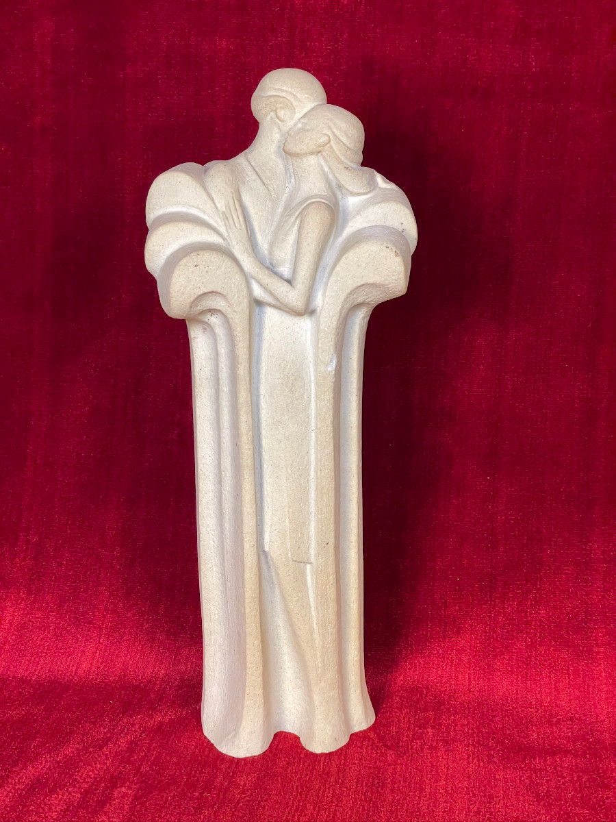 Couple Embracing In A Long Coat, Art Deco Style Stone