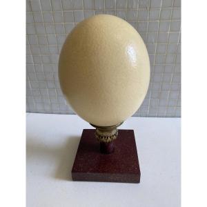 Ostrich Egg Mounted On A Cylindrical Bronze Base.