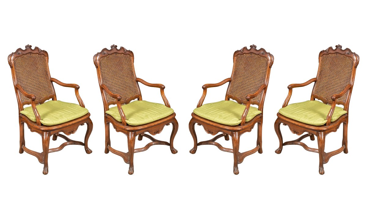 Four Carved Walnut Armchairs. Lombardy, Mid-18th Century.