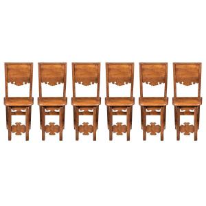 Six Solid Walnut Refectory Chairs. Friuli, 17th Century.