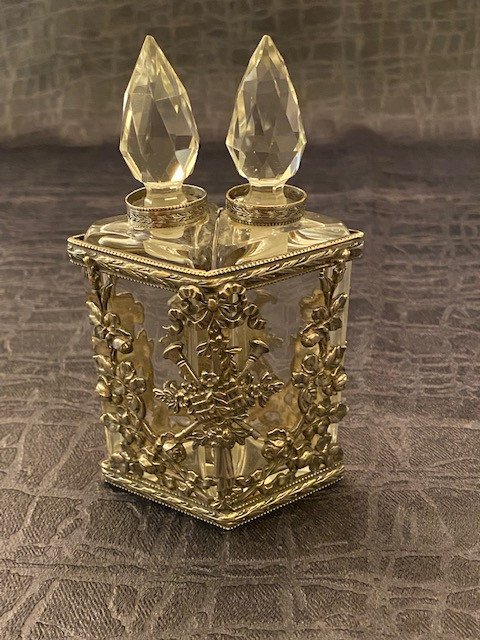 Duo Perfume Bottles Under Silver Metal Cage