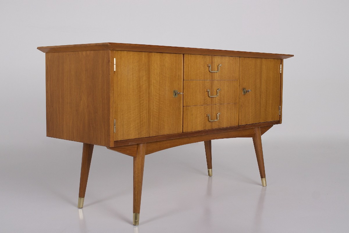 Modernist Sideboard With Brass Compass Legs.