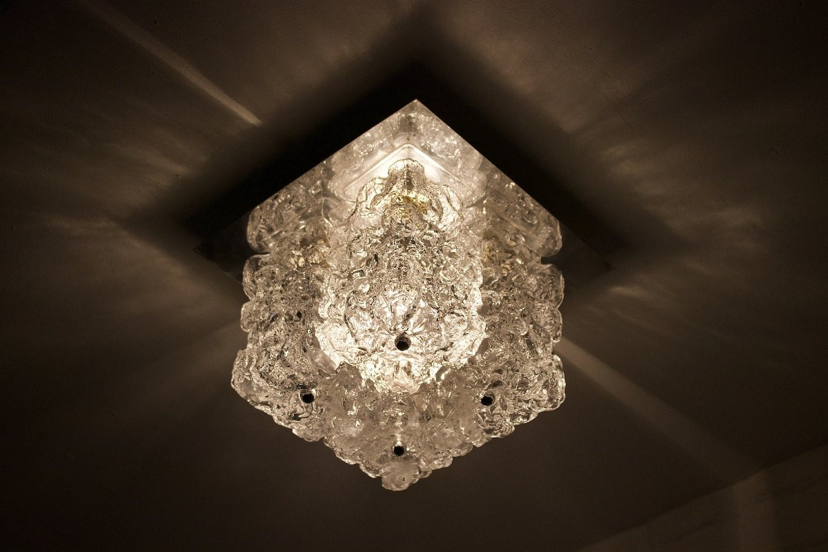 Suspension composée de  quatre globes en verre épais, années 70.