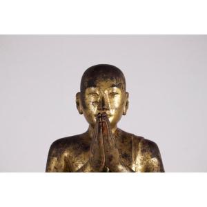 Imposante statue d'un adorant Birman en Bois Doré
