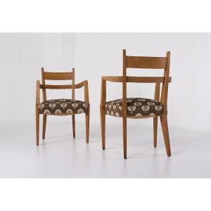 Deux fauteuils en chêne, René-Jean Caillette, France, années 1950.
