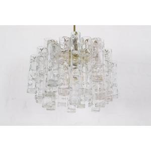 A 1970s Chandelier Made Of Glass And Brass.