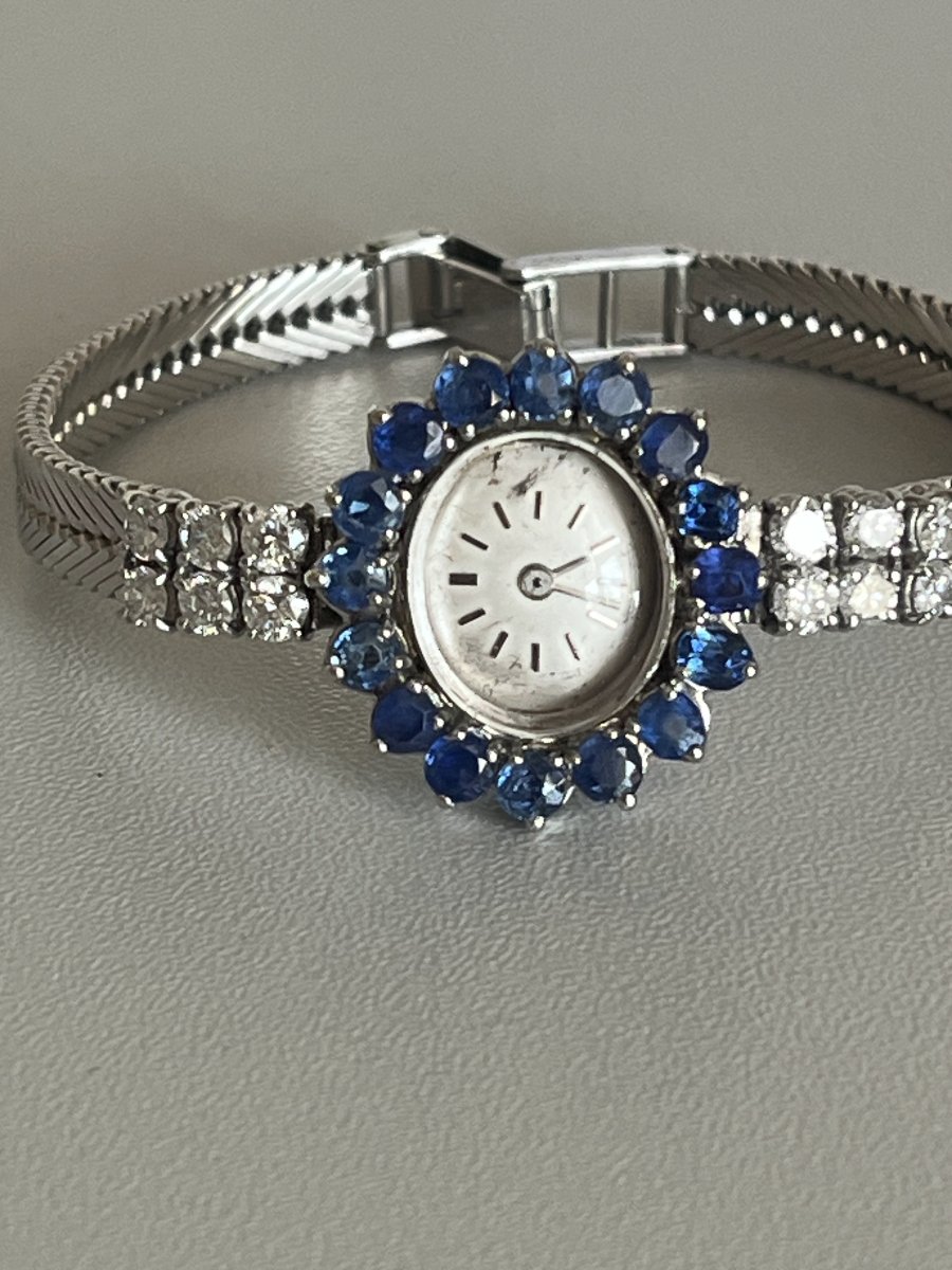 4049- Montre Dame Or Gris Saphirs Diamants
