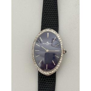 7670- Montre BAUME & MERCIER Or Gris Lapis Lazuli