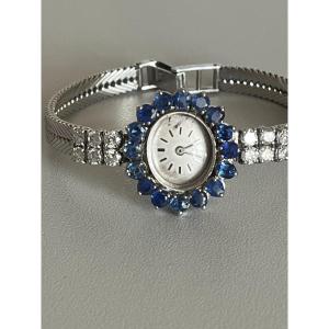 4049- Montre Dame Or Gris Saphirs Diamants