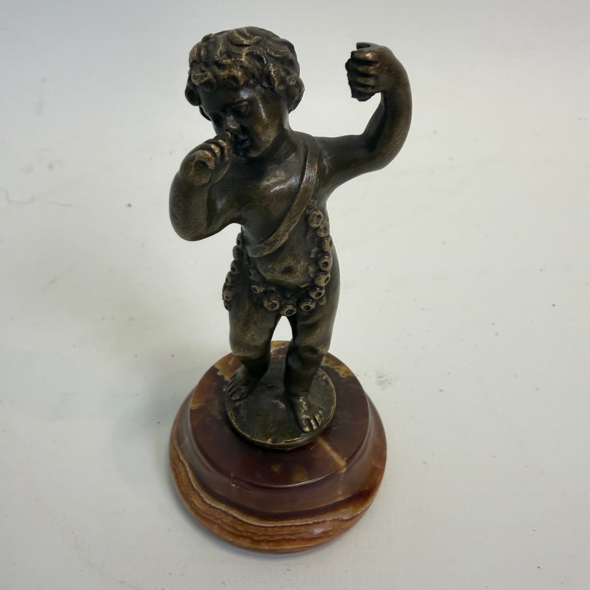 A Bronze "love" On An Onyx Pedestal