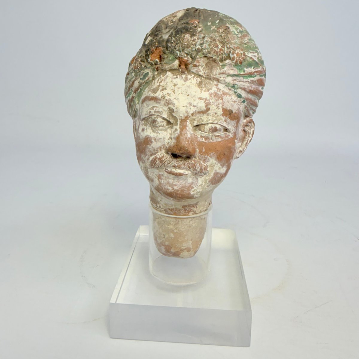 Ancient Sculpture Depicting A Terracotta Head -photo-2