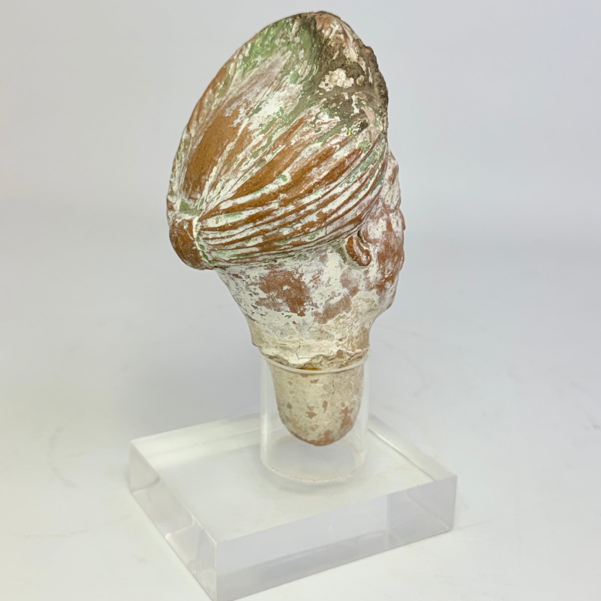 Ancient Sculpture Depicting A Terracotta Head -photo-3