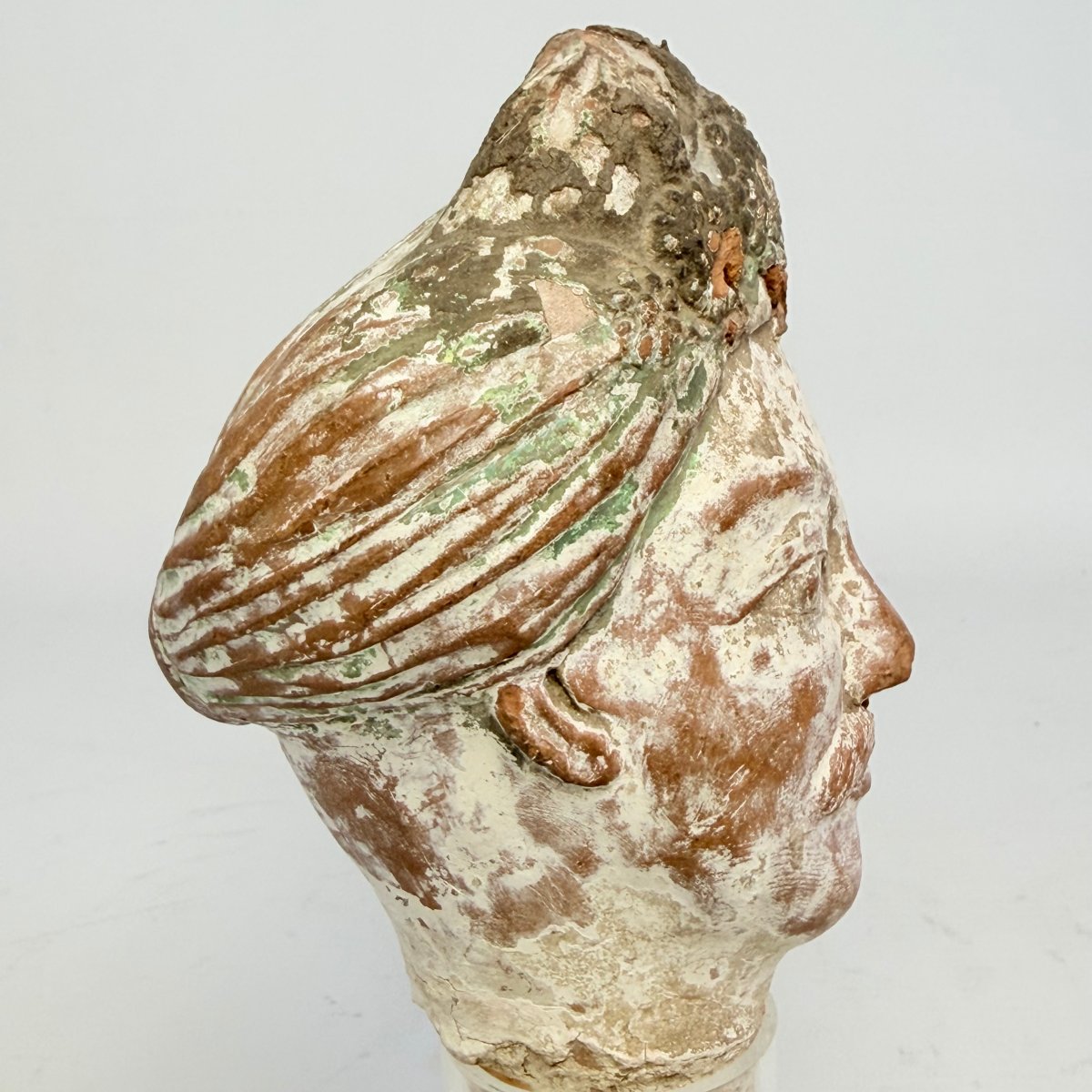 Ancient Sculpture Depicting A Terracotta Head -photo-5