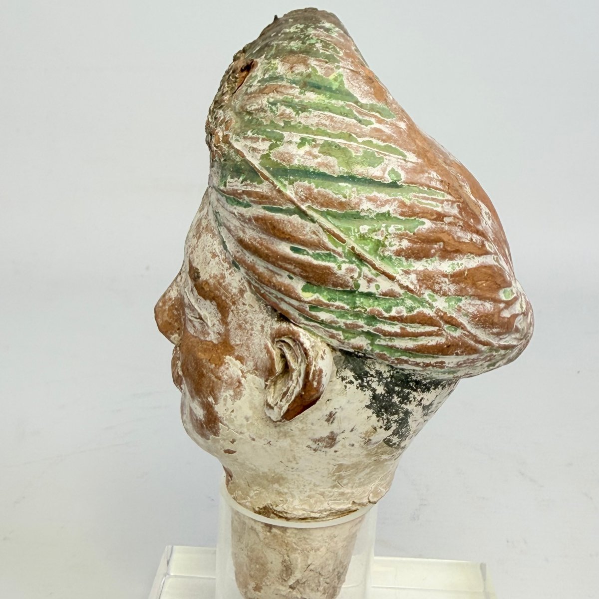 Ancient Sculpture Depicting A Terracotta Head -photo-8