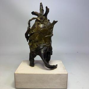 Statue en bronze « Wrapped up is neat ! » de Dirk Lambrecht