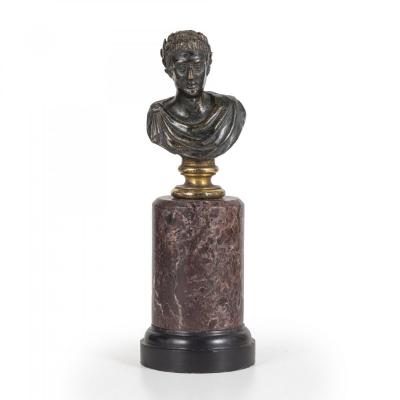 Small Bronze Bust of Jules Caesar, XVII Century.<br />
Base in red Levanto marbre
