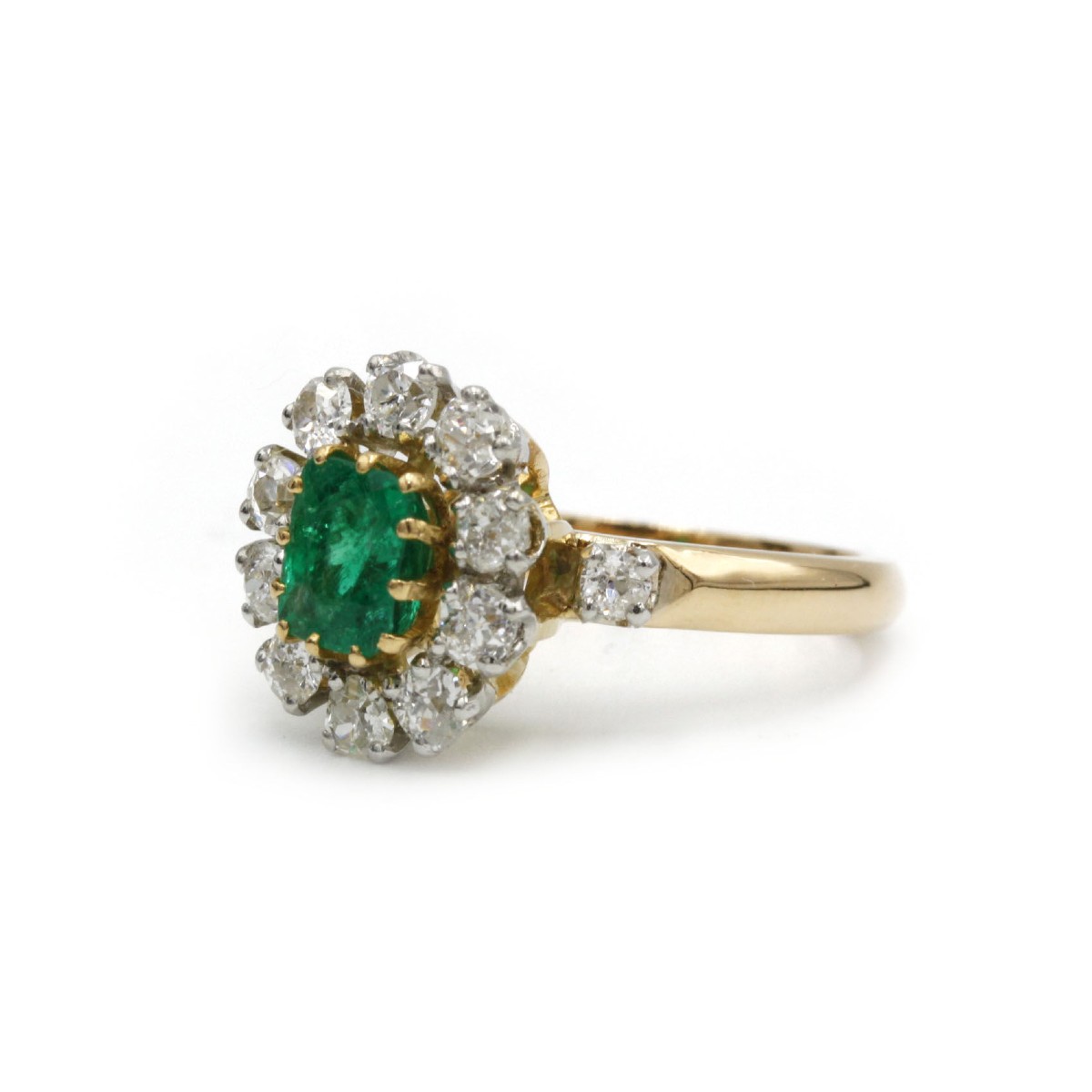 Bague “Marguerite” en or jaune et platine sertie d’émeraude et de diamants