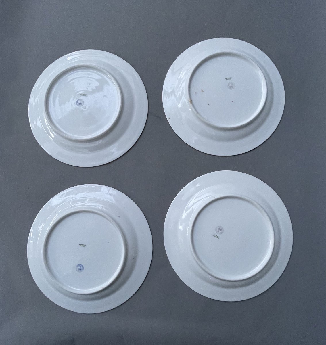 Quatre assiettes en porcelaine de Limoges-photo-2