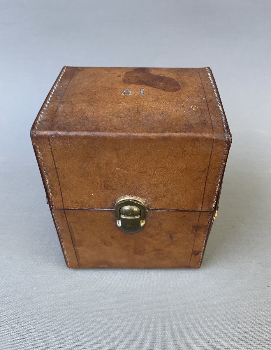 Two Bottles Of Perfume And Their Travel Case-photo-1