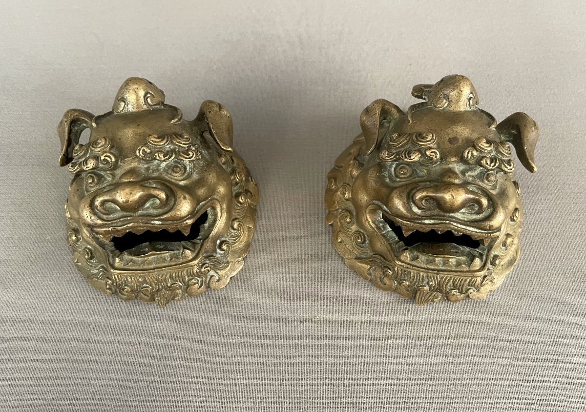 Têtes de chiens de Fô en bronze