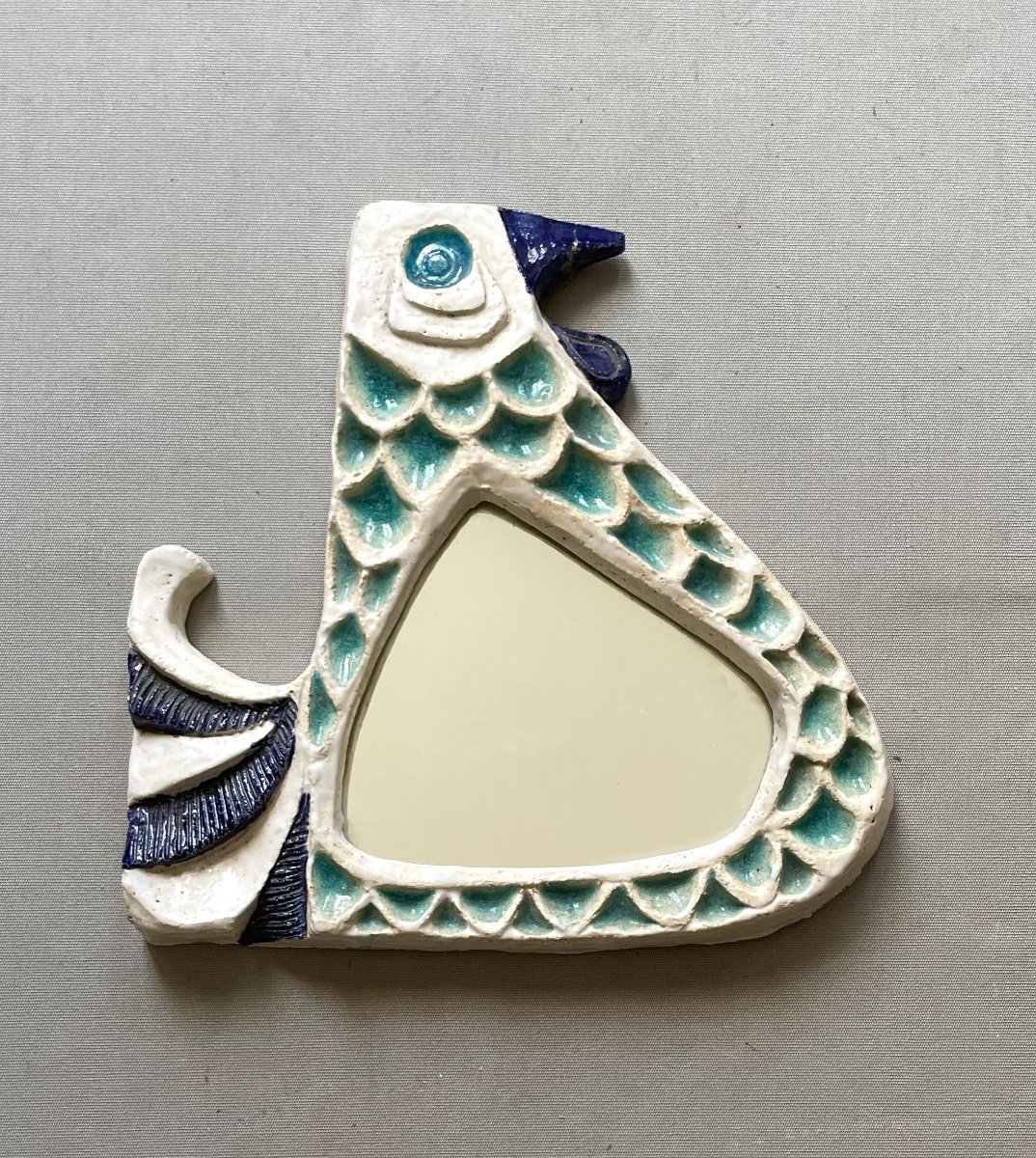 Ceramic Mirror Depicting A Bird
