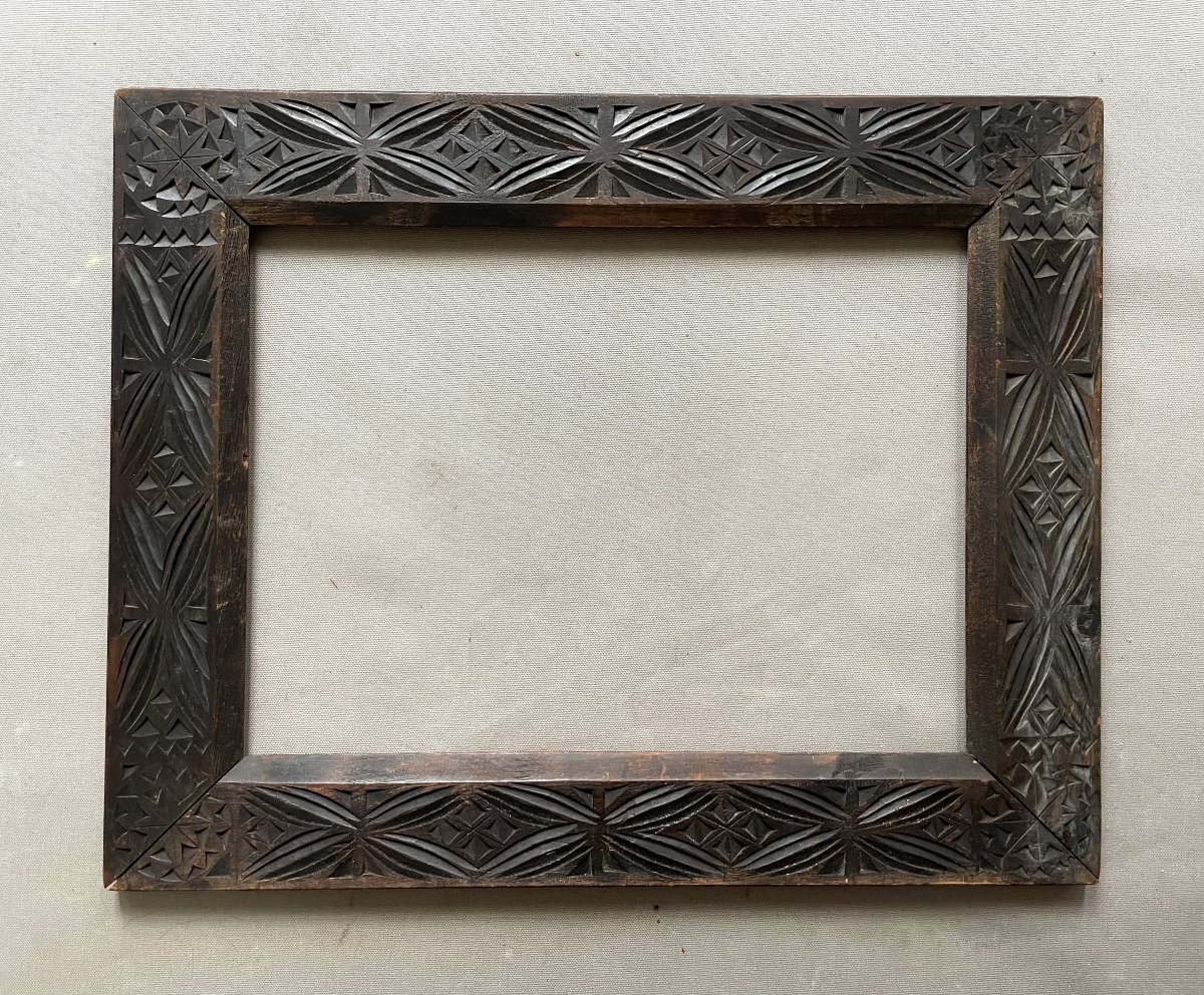 Cadre orientaliste en bois sculpté