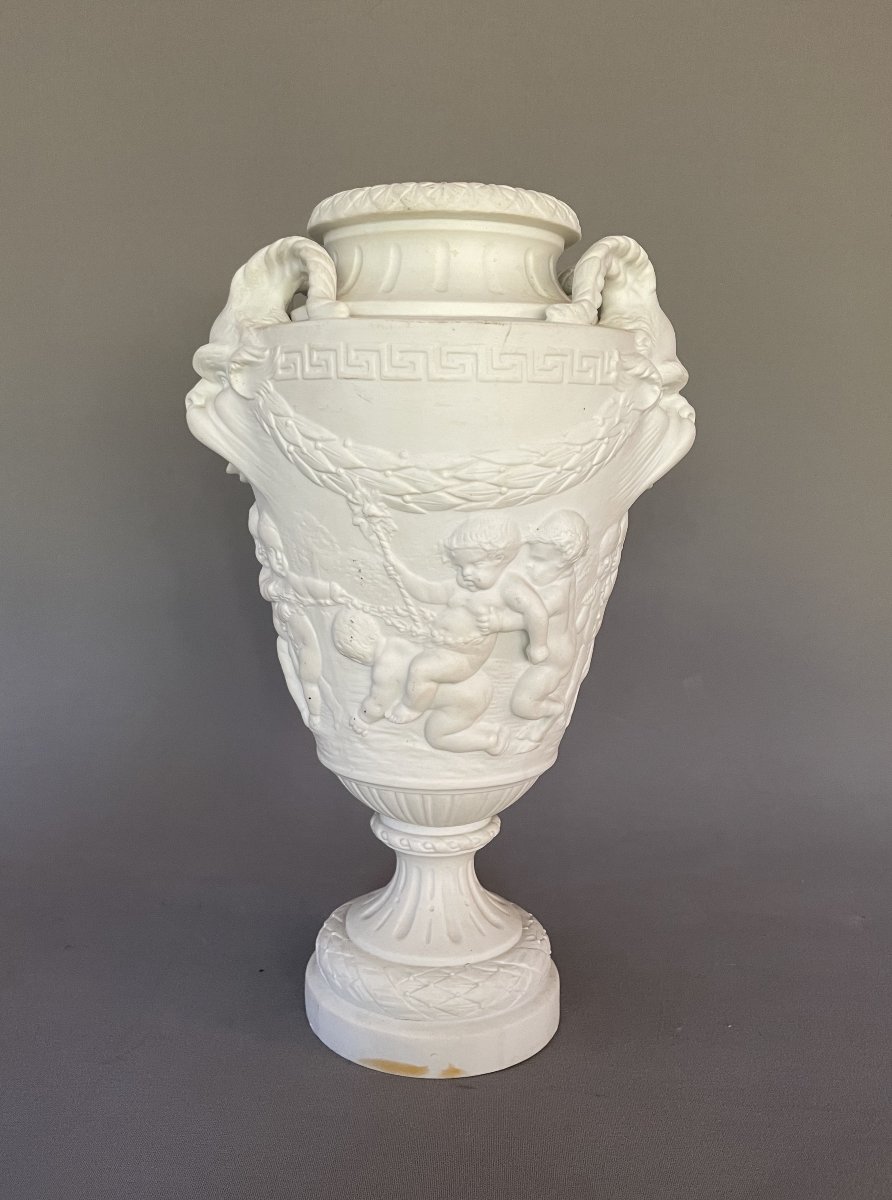 Biscuit-porcelain Vase Decorated With Putti