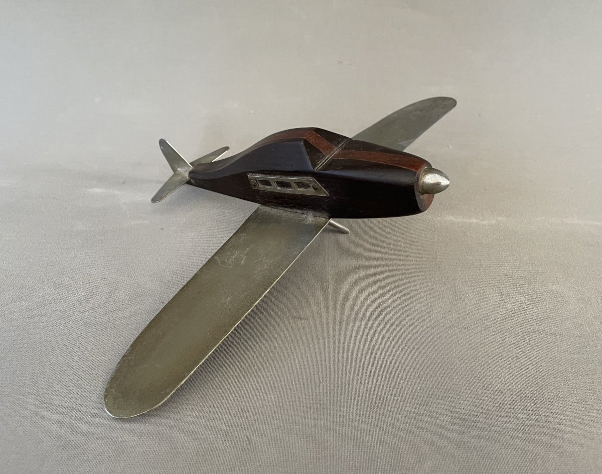 Avion miniature en métal et palissandre