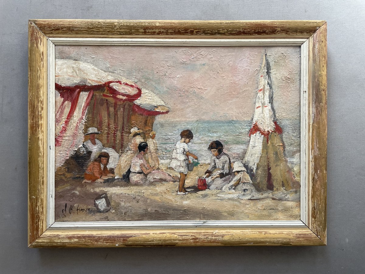 Plage animée, huile sur toile, signature à identifier